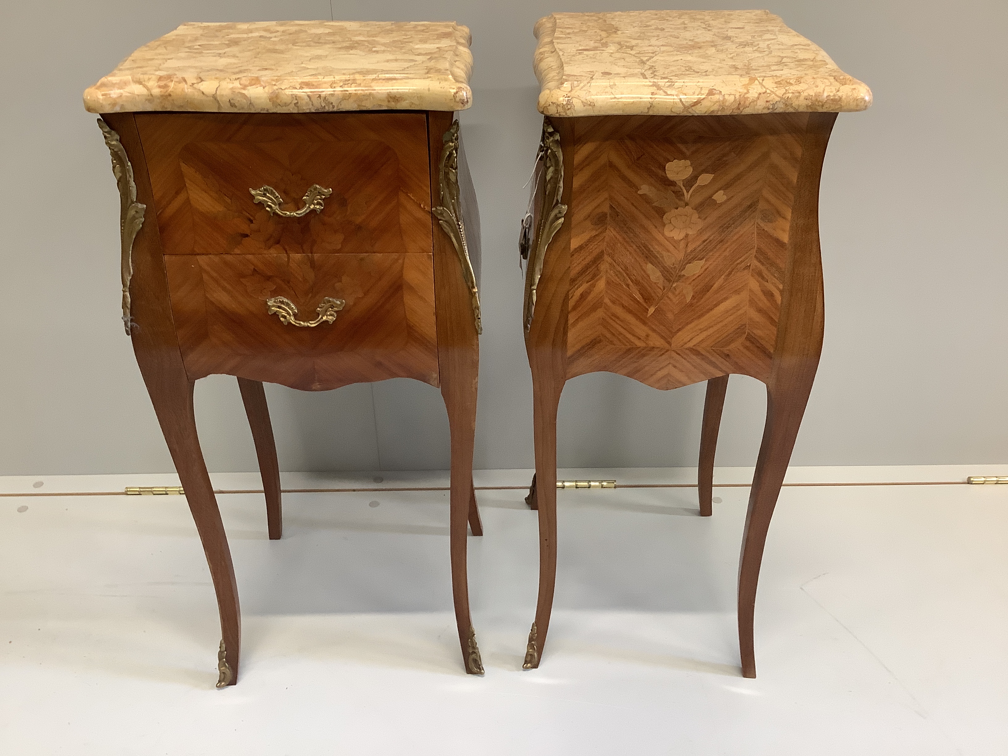 A pair of French Louis XVI style marquetry inlaid kingwood marble topped bedside cabinets, width 34cm, depth 28cm, height 74cm